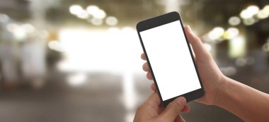 El ele tutuşan akıllı telefon aygıtı ve ekrana dokunma