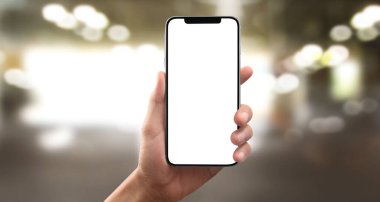 El ele tutuşan akıllı telefon aygıtı ve ekrana dokunma