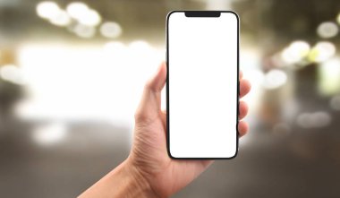 El ele tutuşan akıllı telefon aygıtı ve ekrana dokunma