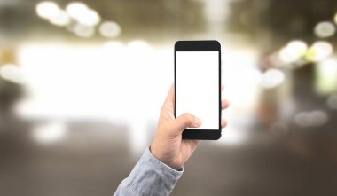 El ele tutuşan akıllı telefon aygıtı ve ekrana dokunma