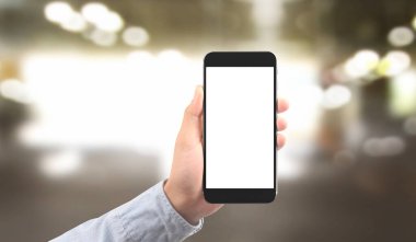 El ele tutuşan akıllı telefon aygıtı ve ekrana dokunma