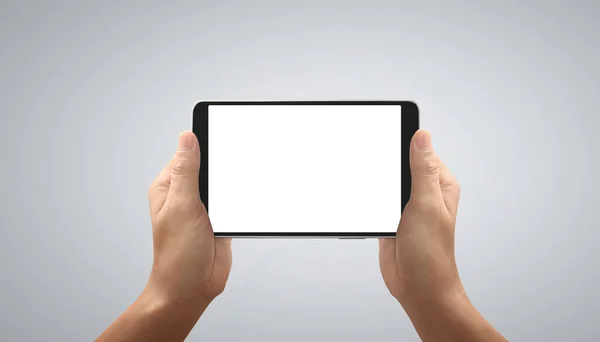 独立した画面でタブレットタッチコンピュータガジェットを保持 — ストック写真