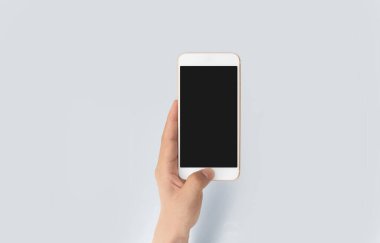 El ele tutuşan akıllı telefon aygıtı ve ekrana dokunma