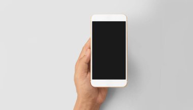El ele tutuşan akıllı telefon aygıtı ve ekrana dokunma