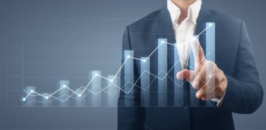 İşadamı, işinde grafik büyümesi ve grafik artışı için olumlu göstergeler planlıyor