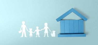 Ayrılmış minyatür ev modeli. gayrimenkul yatırım kavramı