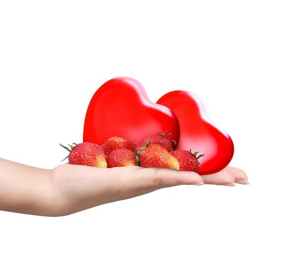 Holding strawberries and heart — Stock Photo, Image