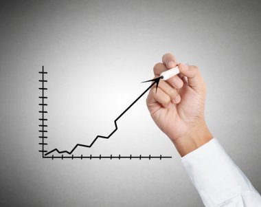 iş adamı el bir grafik çizimi 