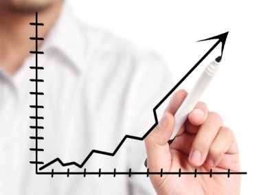 işadamı ile finansal simgeler