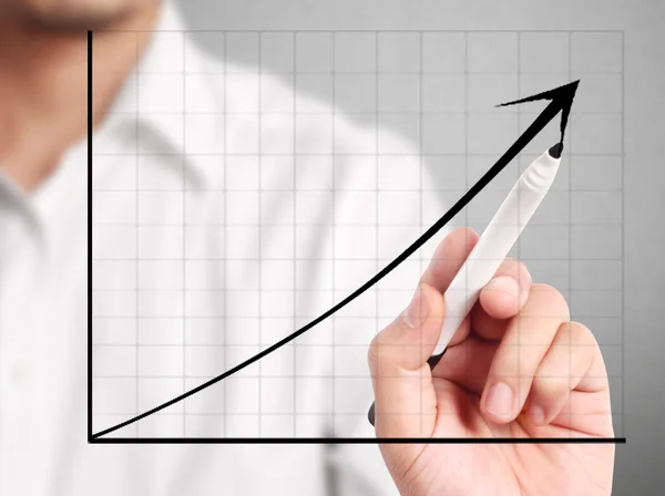 Man hand drawing a chart — Stock Photo, Image