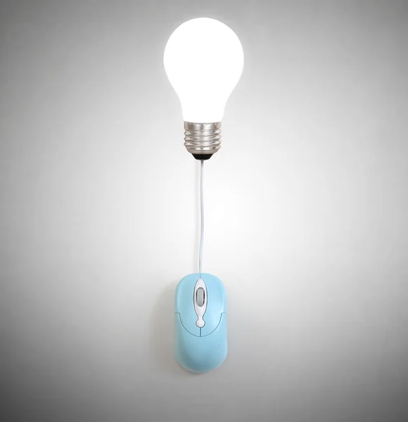 Creative light bulb symbol with computer mouse sign — Stock Photo, Image