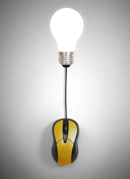 Kreativa light bulb symbol med dator mus tecken — Stockfoto