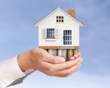 ev sahipliği temsil eden holding evi 