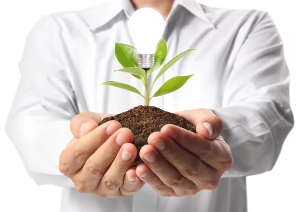 Ideas bulb light in the hand — Stock Photo, Image