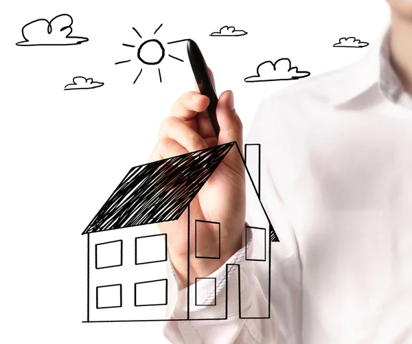 Drawing a growing real estate chart — Stock Photo, Image