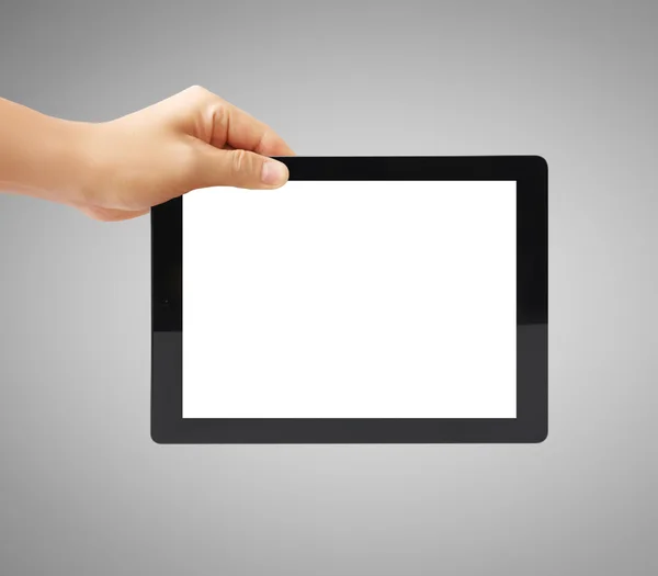 Тримає планшет з сенсорним екраном — стокове фото