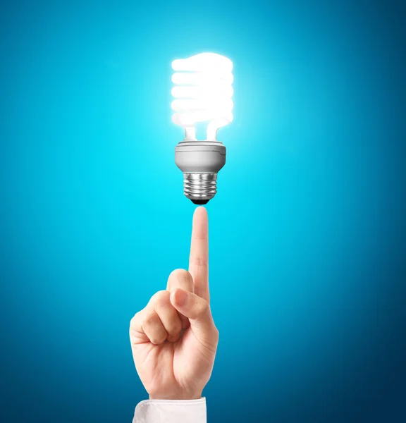 Light bulb in a hand — Stock Photo, Image