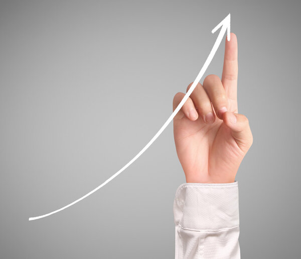 Businessman Touching a Graph