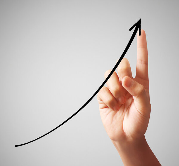 Businessman Touching a Graph