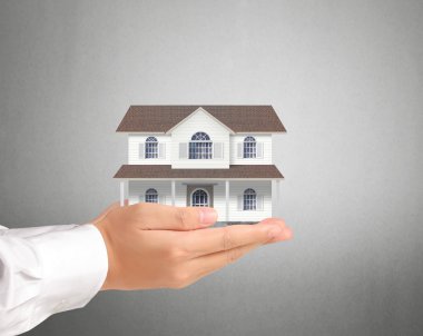ev sahipliği temsil eden holding evi 