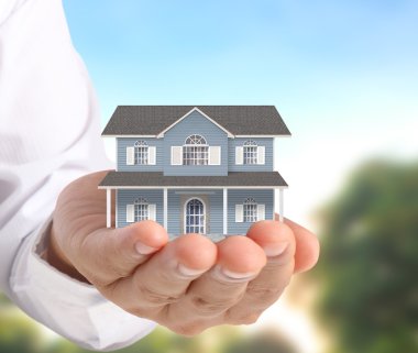 ev sahipliği temsil eden holding evi 