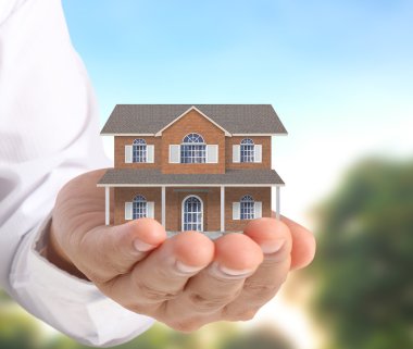 ev sahipliği temsil eden holding evi 