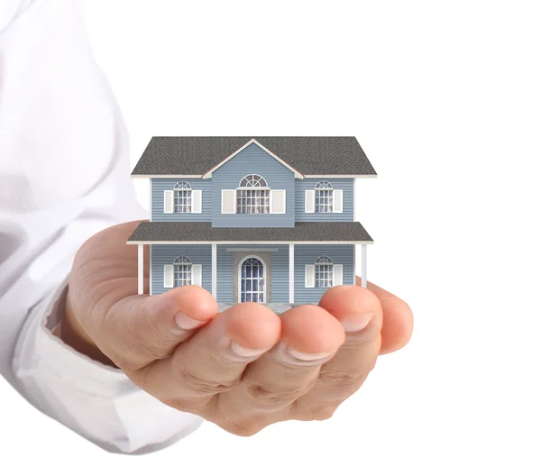 Holding house representing home ownership — Stock Photo, Image