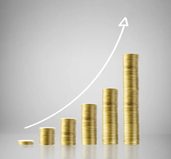 Coins graph stock market — Stock Photo, Image