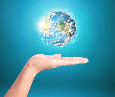 Dünya, insan eli, bizim gezegen Dünya'ya glowin tutan el Earth'te