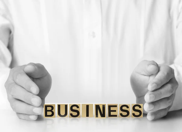 Ordet i business man hand — Stockfoto