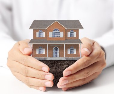 ev sahipliği temsil eden holding evi