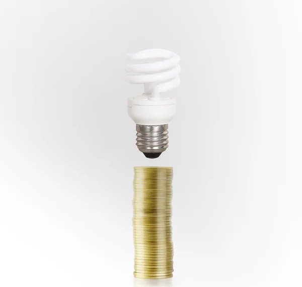 Bulb With Stack Of Coins — Stock Photo, Image