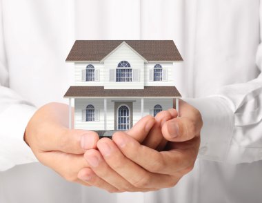 ev sahipliği temsil eden holding evi