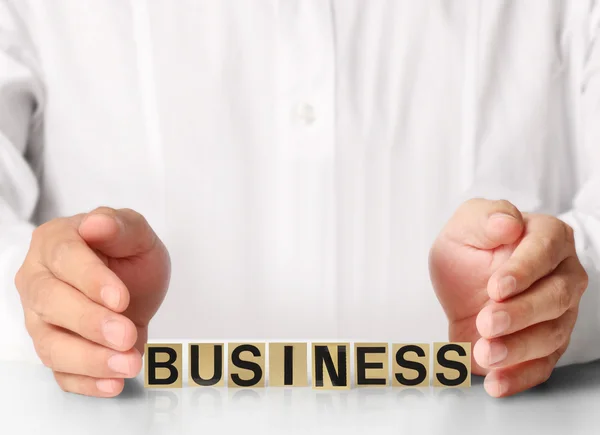 Word in business man hand — Stock Photo, Image