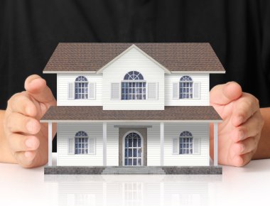 ev sahipliği temsil eden holding evi