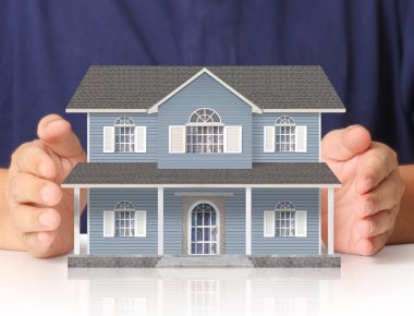 ev sahipliği temsil eden holding evi