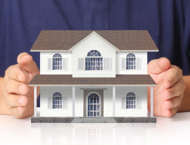 ev sahipliği temsil eden holding evi