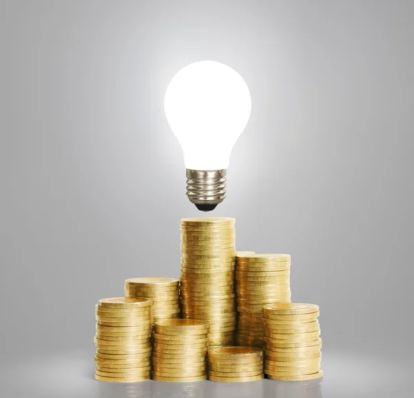 Bulb With Stack Of  Coins — Stock Photo, Image