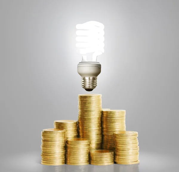 Bulb With Stack Of  Coins — Stock Photo, Image