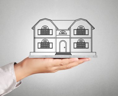 ev sahipliği temsil eden holding evi