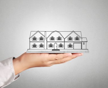 ev sahipliği temsil eden holding evi