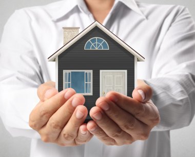 ev sahipliği temsil eden holding evi