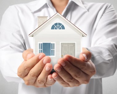 ev sahipliği temsil eden holding evi