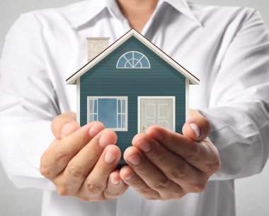 ev sahipliği temsil eden holding evi