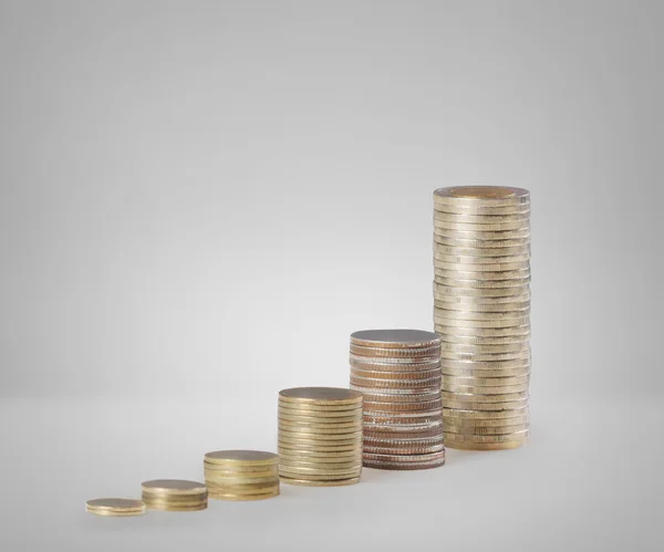 Coins graph stock market — Stock Photo, Image