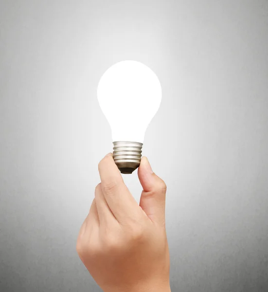 Lâmpada, ideia lâmpada criativa na mão — Fotografia de Stock