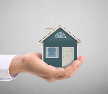 ev sahipliği temsil eden holding evi