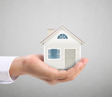 ev sahipliği temsil eden holding evi