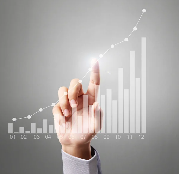 Businessman Touching graph — Stock Photo, Image