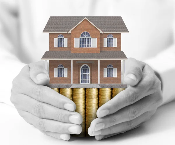 Holding house representing home ownership — Stock Photo, Image